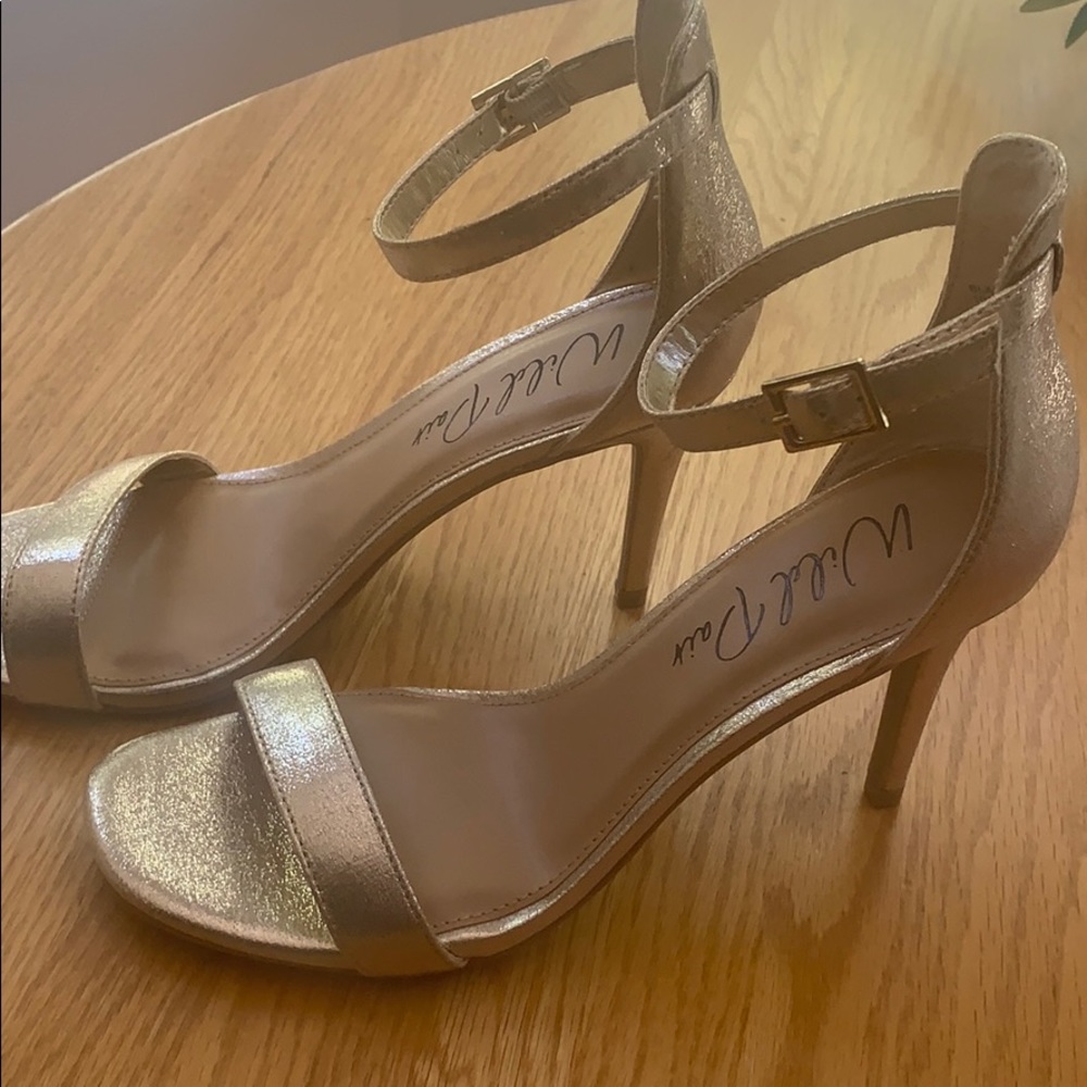 NIB.  Gold shimmer heals.  Ankle strap.